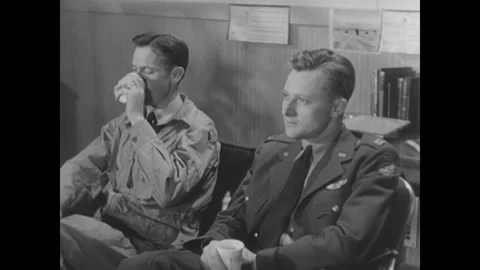 UNITED STATES - 1952: US Air Force airmen with coffee in a crew room Stock Footage 342231053