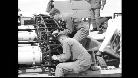 UNITED STATES - 1954 - Technicians fix the engines of the rocket sled as Stock Footage 325212217