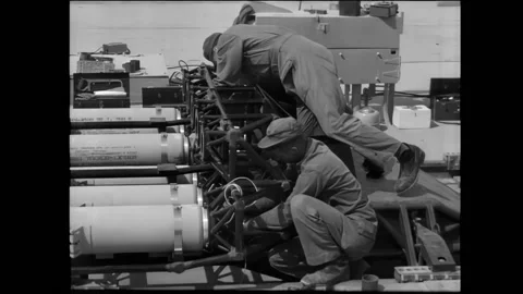 UNITED STATES - 1954 - Technicians securing cables and preparing the engines of Stock Footage 325217217