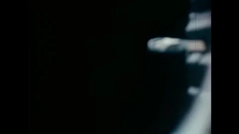 UNITED STATES - 1960 - A massive red-and-white parachute twirls above the Vídeo Stock 341992996