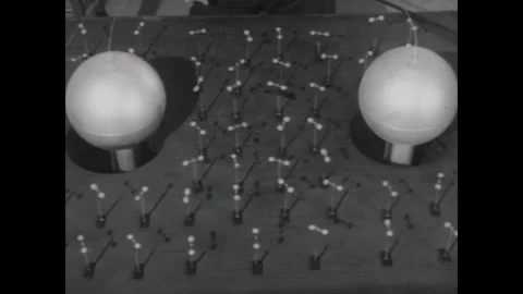 United States 1960s: A hand points toward a grid of small, glowing spheres and Stock Footage 344754068
