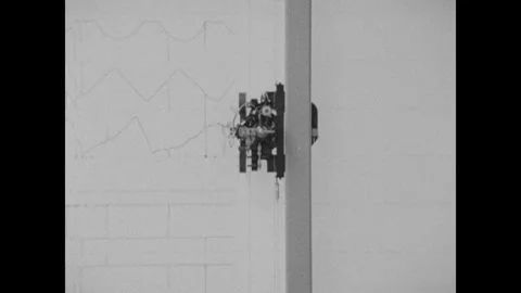 United States 1960s: Plotter traces lines. Numbers print on dot matrix printer. Stock Footage 323474936