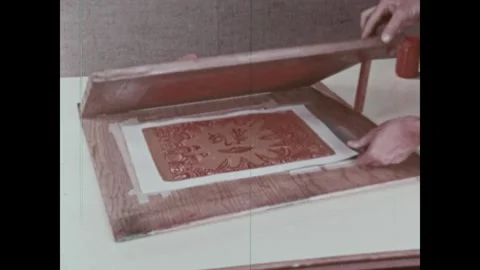 United States 1960s: A printmaking process is shown where a graphic design of an Stock Footage 344767725
