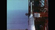 United States 1960S: Top Of Space Rocket Held By Scaffolding.  Field Of Growing Stock Footage