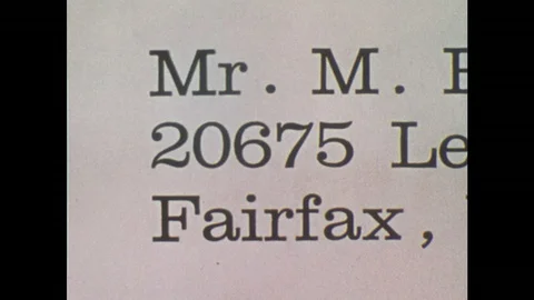 UNITED STATES: 1960s: Zip code on a letter. Scanner light reading the address on Stock Footage 75249868
