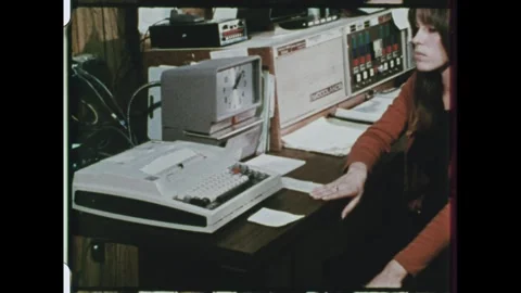 United States 1970s: A dispatch operator works in a medical emergency center. A Stock Footage 325223323