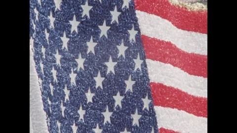United States 1970s: Parade float of the American flag. Marching band follows. Stock Footage 323325986