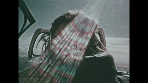 United States 1970s: A pilot inside a glider cockpit with a canopy frame Stock Footage 340653464