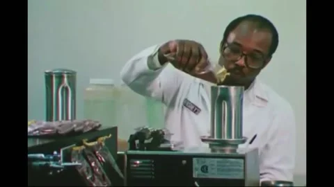 UNITED STATES - 1970s - Quality control checks packaged Hershey's products Stock Footage 296400717
