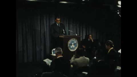 UNITED STATES - 1972: Reading notes - Spokesman consults notes at sealed lectern Stock Footage 344498048