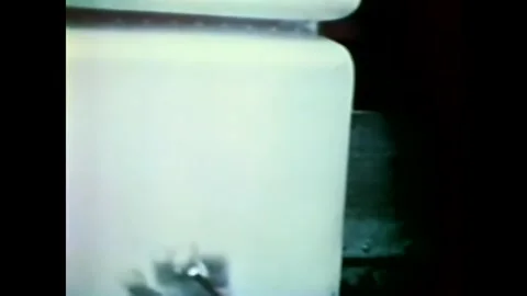 UNITED STATES - 1973 - Skylab 3 astronaut Owen Garriott grabs the magnets before Stock Footage 340653059