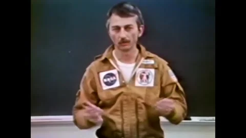 UNITED STATES - 1973 - Skylab 3 astronaut Owen Garriott explains how he Stock Footage 340653065