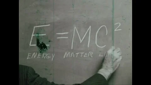 UNITED STATES - 1978 - A hand writes on the blackboard explaining the concept of 스톡 동영상 340668071