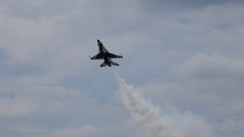 A United States Air Force Thunderbird performs a solo pass Stock Footage 111597019