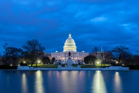 The United States Capitol with reflection at night, Washington DC, USA Stock Photos