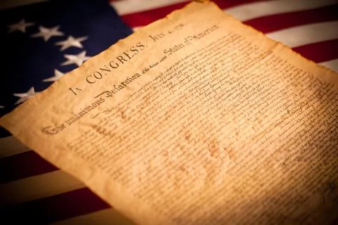 United states declaration of independence on flag background Stock Photos