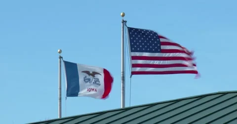 United States Flag and State of Iowa Flag Blowing in Wind - 4k Stock Footage