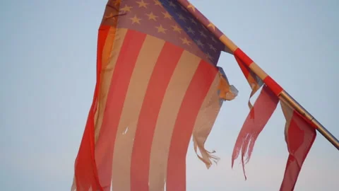 United States frayed flag waving in the wind in slow motion 180fps Stock Footage 155746697