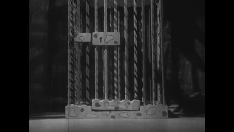 UNITED STATES: Puppet is placed in cage and curtains open to begin puppet show. Stock Footage 75249245