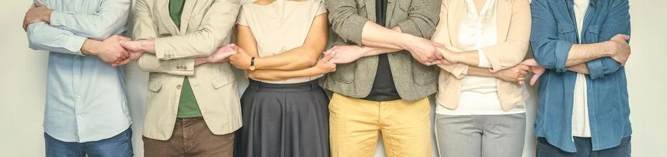 Unity, and shared commitment towards common goal. Trust, support, and strong Stock Photos