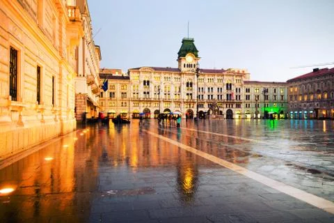 Unity of Italy Square in Trieste, Italy at night during the heavy raining Stock Photos