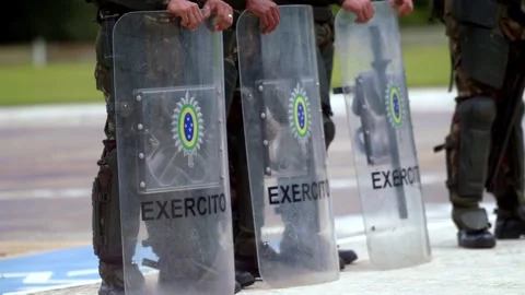 Unity we stand, as one we wield, trouble strikes, we raise our shield Stock Footage 293277800