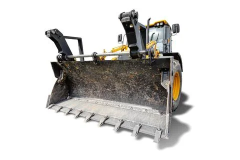 A universal excavator-loader is parked at a construction site. The equipment  Stock Photos