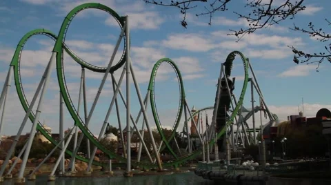 Universal green roller coaster ride ultra wide Stock Footage 52858086