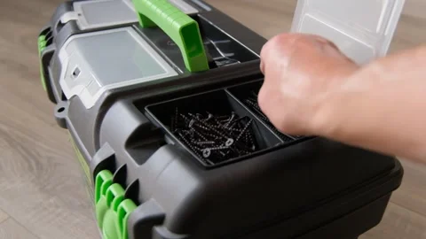 A universal portable tool storage box with additional organizers for supplies. Stock Footage 308282140