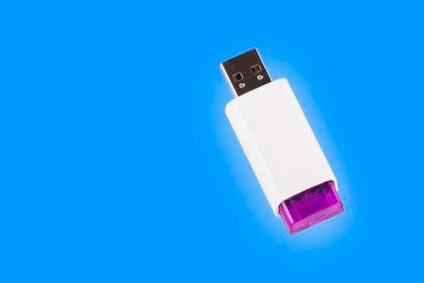 Universal serial bus USB drive isolated over the blue background. 写真素材