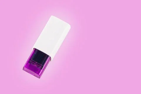Universal serial bus USB drive isolated over the purple background. 写真素材