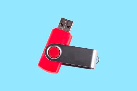 Universal serial bus USB drive isolated over the blue background. Stock Photos