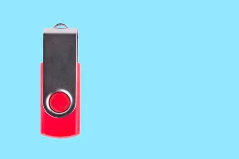 Universal serial bus USB drive isolated over the blue background. Stock Photos