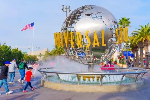 Universal Studios Globe Monument with Visitors in Los Angeles Stock Photos