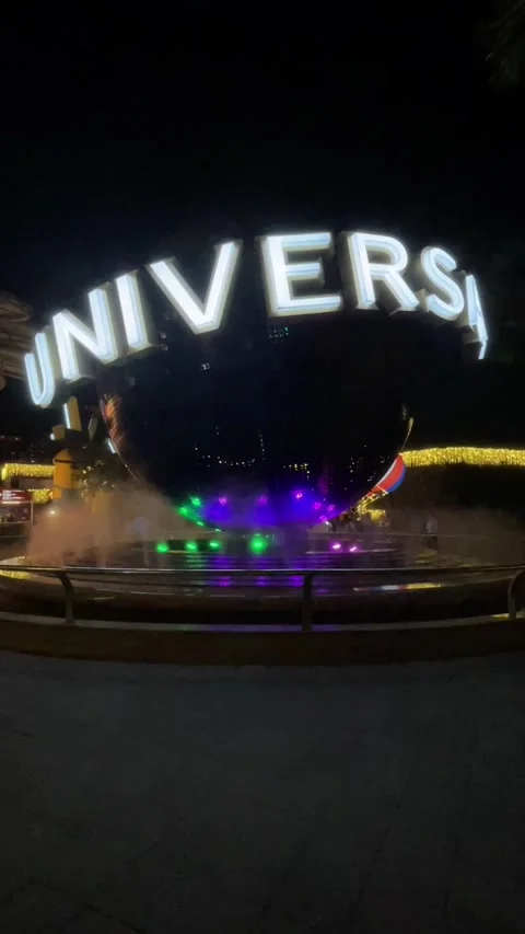 Universal Studios Singapore Rotating Globe Illuminated At Night In Sentosa Park Stock Footage 295998540