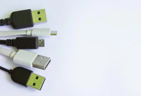 Universal USB cable in white and black for mobile phones. for connecting micr Stock Photos