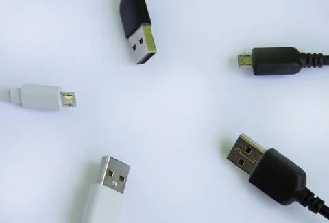 Universal USB cable in white and black for mobile phones. for connecting micr Stock Photos