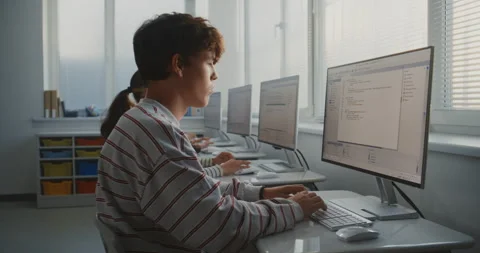 University Classroom With Students Coding on Computers Stock Footage 318521020