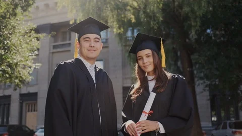 University degree in modern higher knowledge institute. Adult handsome asian guy Stock Footage 116171133