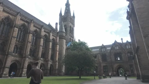 University of Glasgow - Students Walking Through The Gothic Quadrangle. Stock Footage 338213537