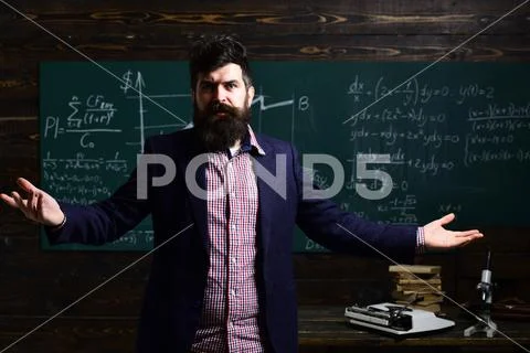 University male speaker conducts business training. Teacher is warm. Education Stock Photos