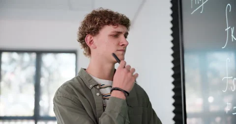 University, man and thinking of math, problem solving or study challenge on Stock Footage 280878239