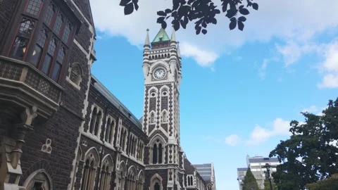 University of otago clock tower with moving clouds Stock Footage 330026425
