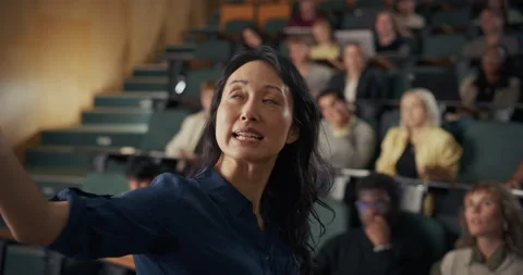 University Professor Lecturing to Audience Stock Footage 326416206