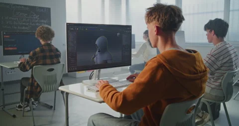 University Student Creates 3D Game Character on Computer During Game Development Stock Footage 318517278