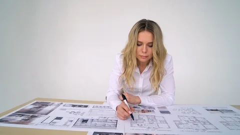 University student of Interior Design doing homework, completing housing project Stock Footage 88644057