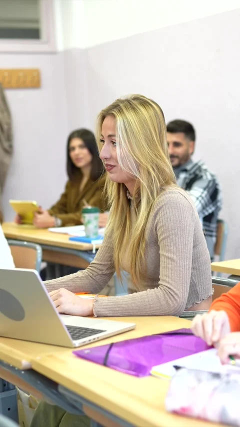 University student participating in interactive class session Stock Footage 302818989
