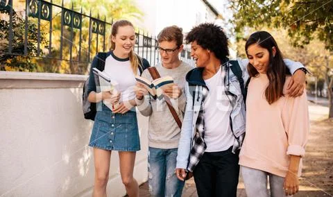 University students with books in college campus Stock Photos