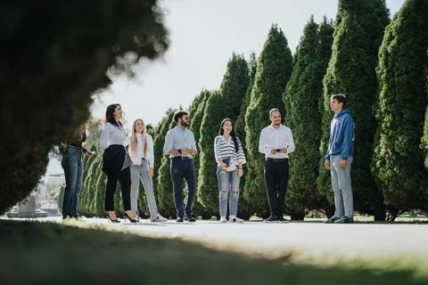 University Students Collaborating on Projects and Learning Together in a Sunny 스톡 사진