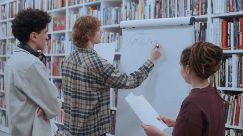 University students solving math problem together 스톡 동영상 335127228